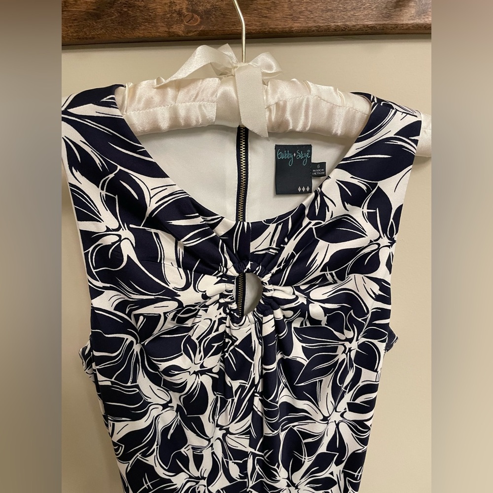 Women’s calf length sleeveless tropical navy blue dress